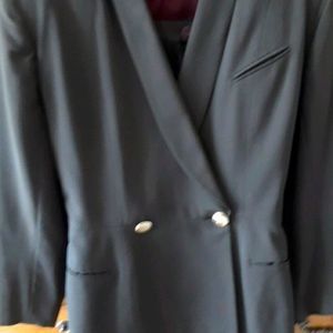 Woman's brown skirt suit